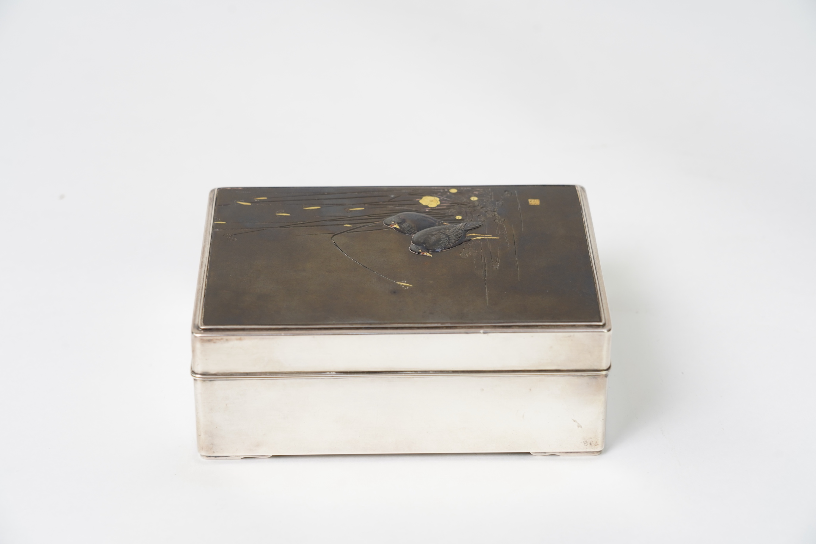 A Japanese shibuichi and shakudo mounted silver box and cover, Taisho period